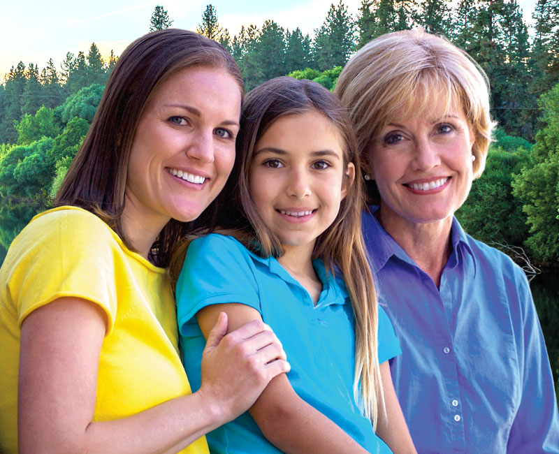 Family smiling after dentistry from Soos Creek Dental, Covington WA
